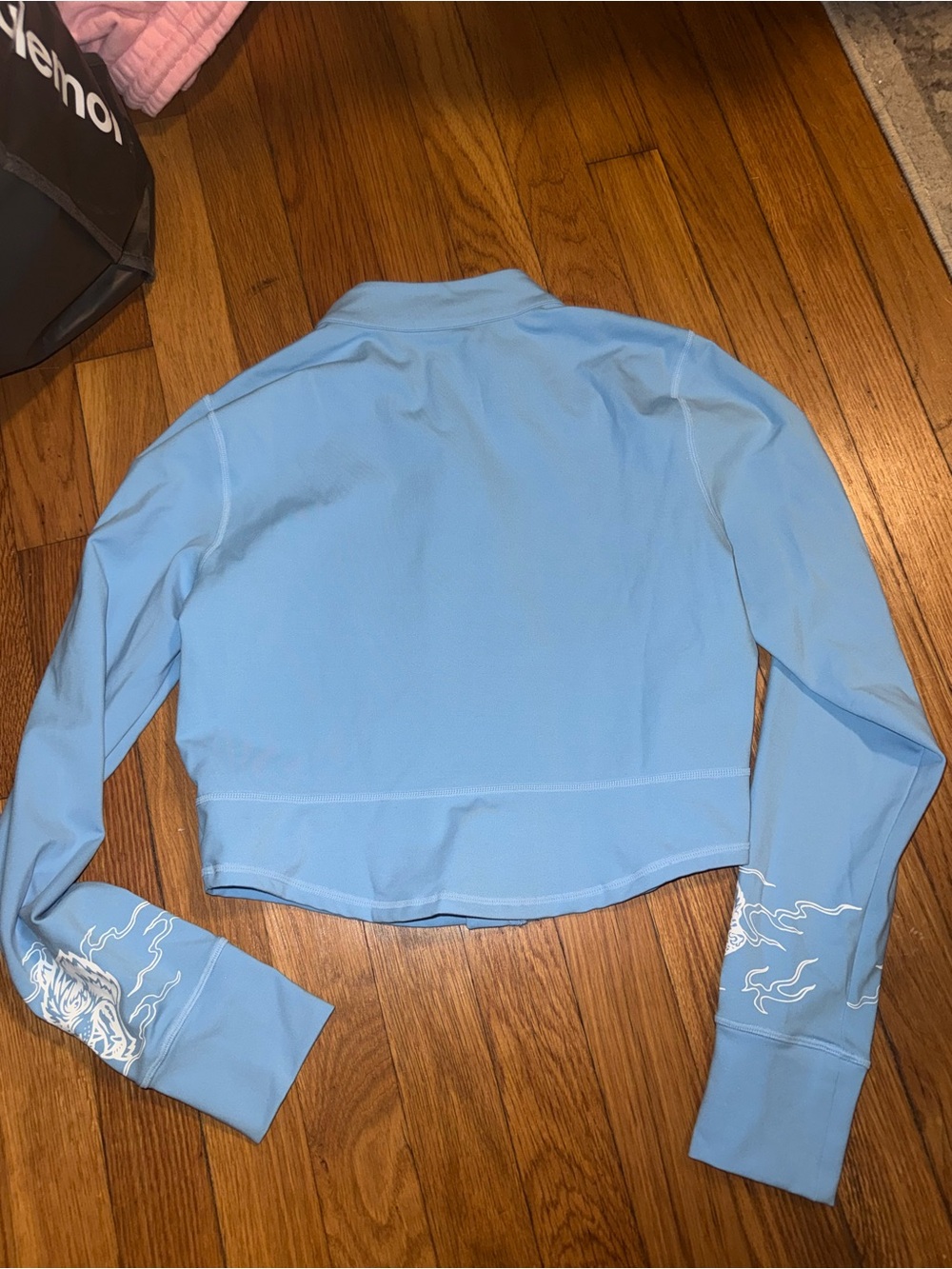 Darc Sport Light Blue Zip-Front Women's Top with Graphic Detail - Picture 3 of 3